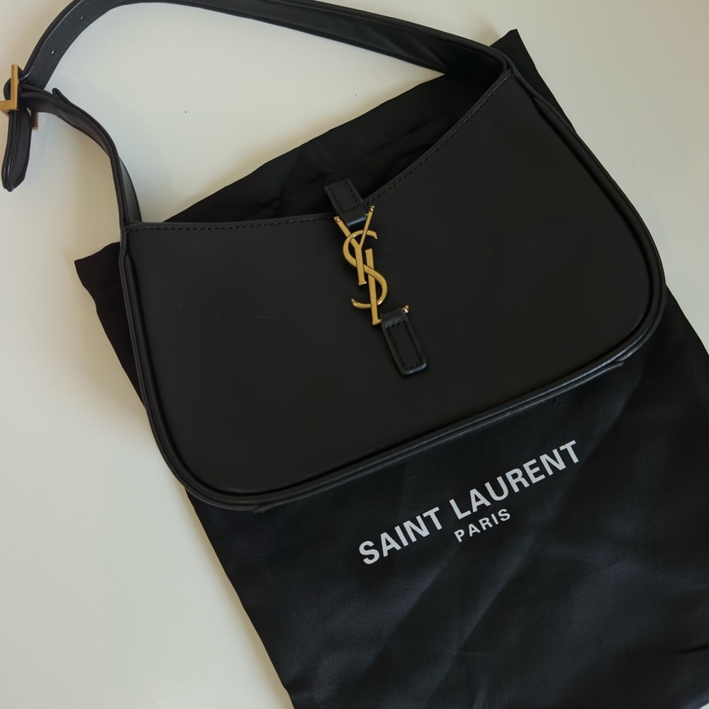Saint Laurent Black Bag with Gold Logo